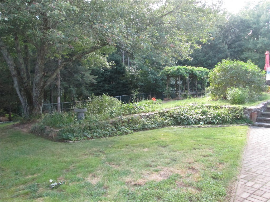 90 Scott Road Cumberland, RI 02864 - Photo 3 of 37 FENCED YARD ABUTTING POOL