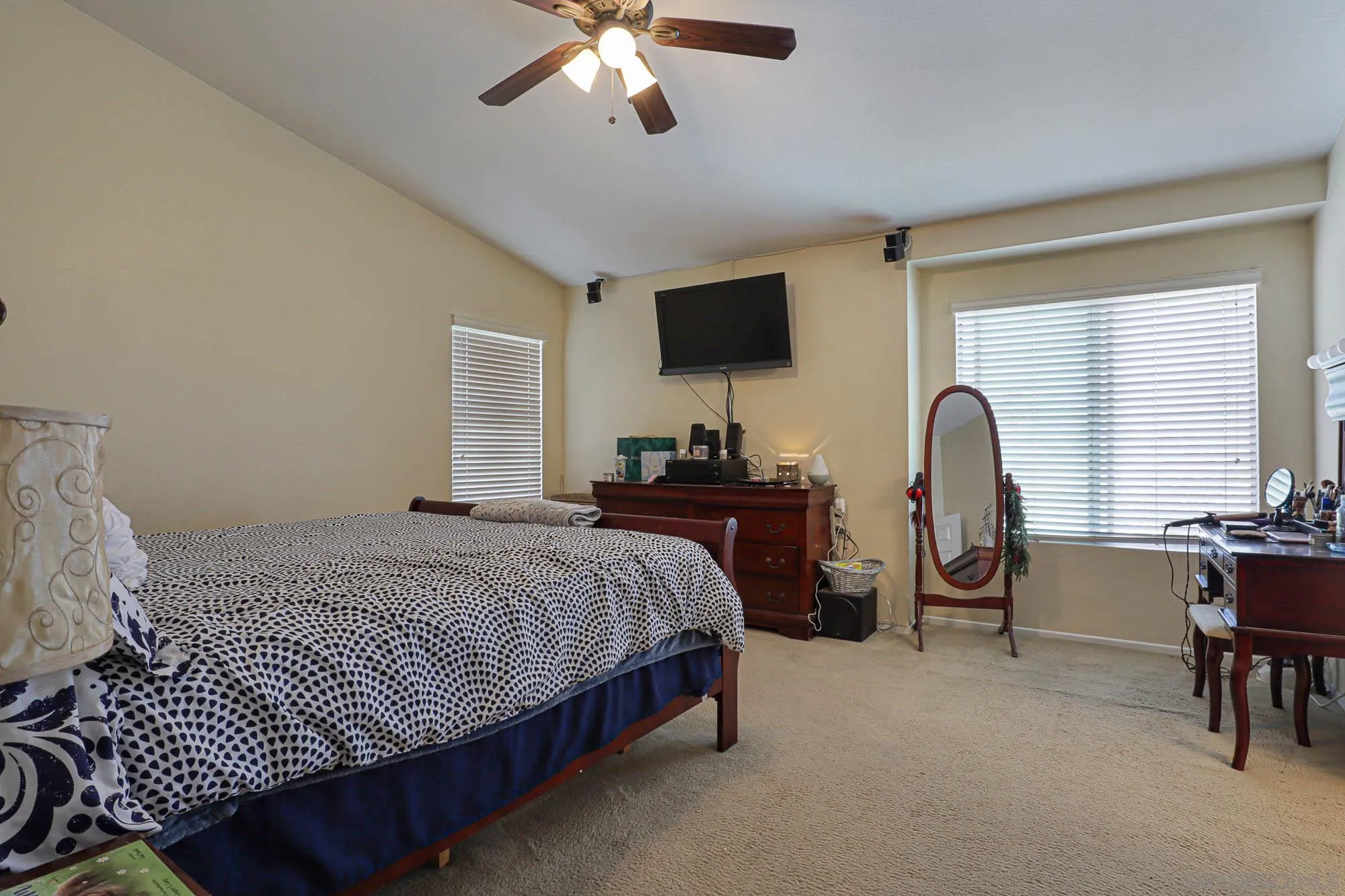 914 Rigley Street Chula Vista, CA 91911 - Photo 19 of 35 a bedroom with bed and a flat screen tv