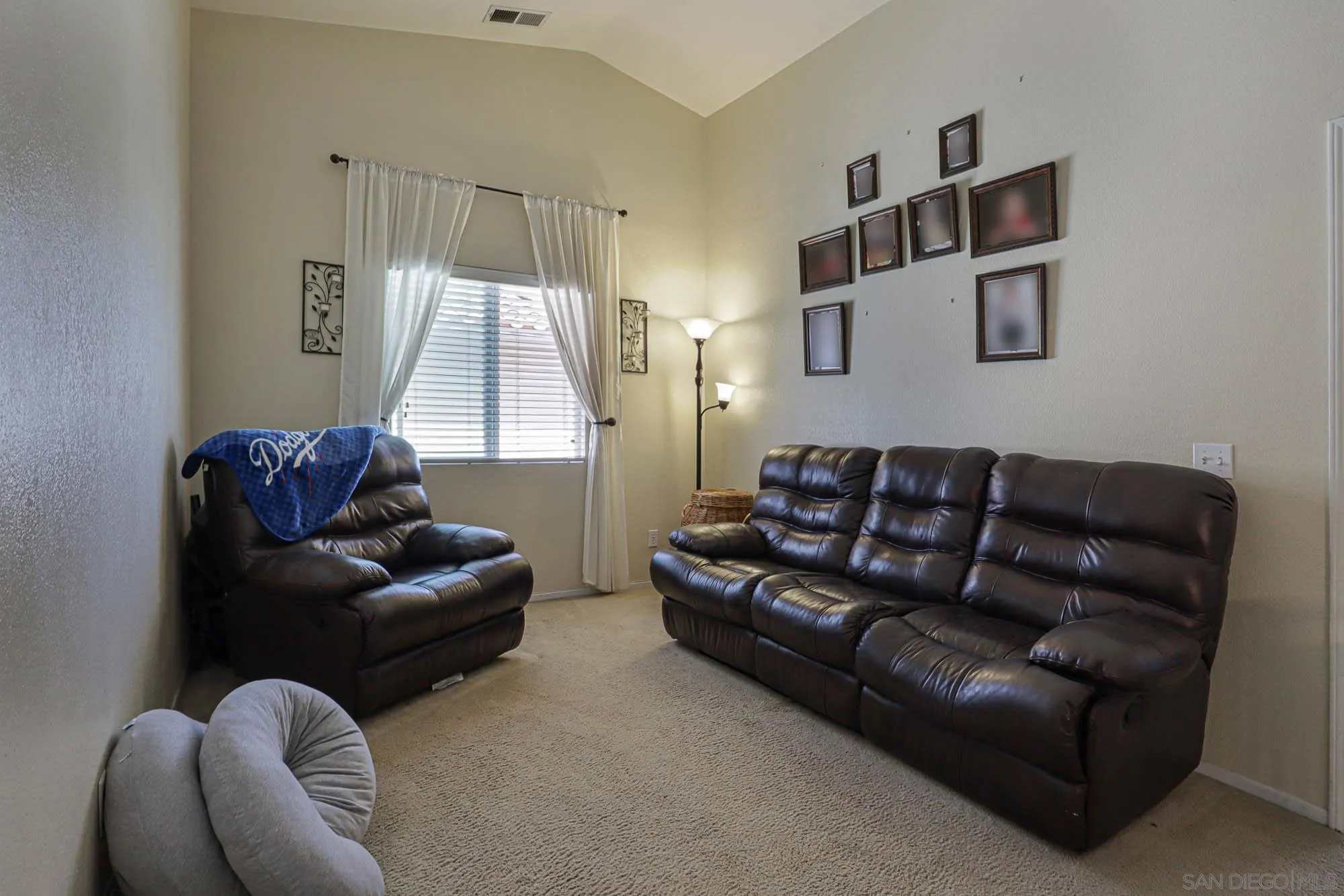 914 Rigley Street Chula Vista, CA 91911 - Photo 27 of 35 a living room with furniture and a window