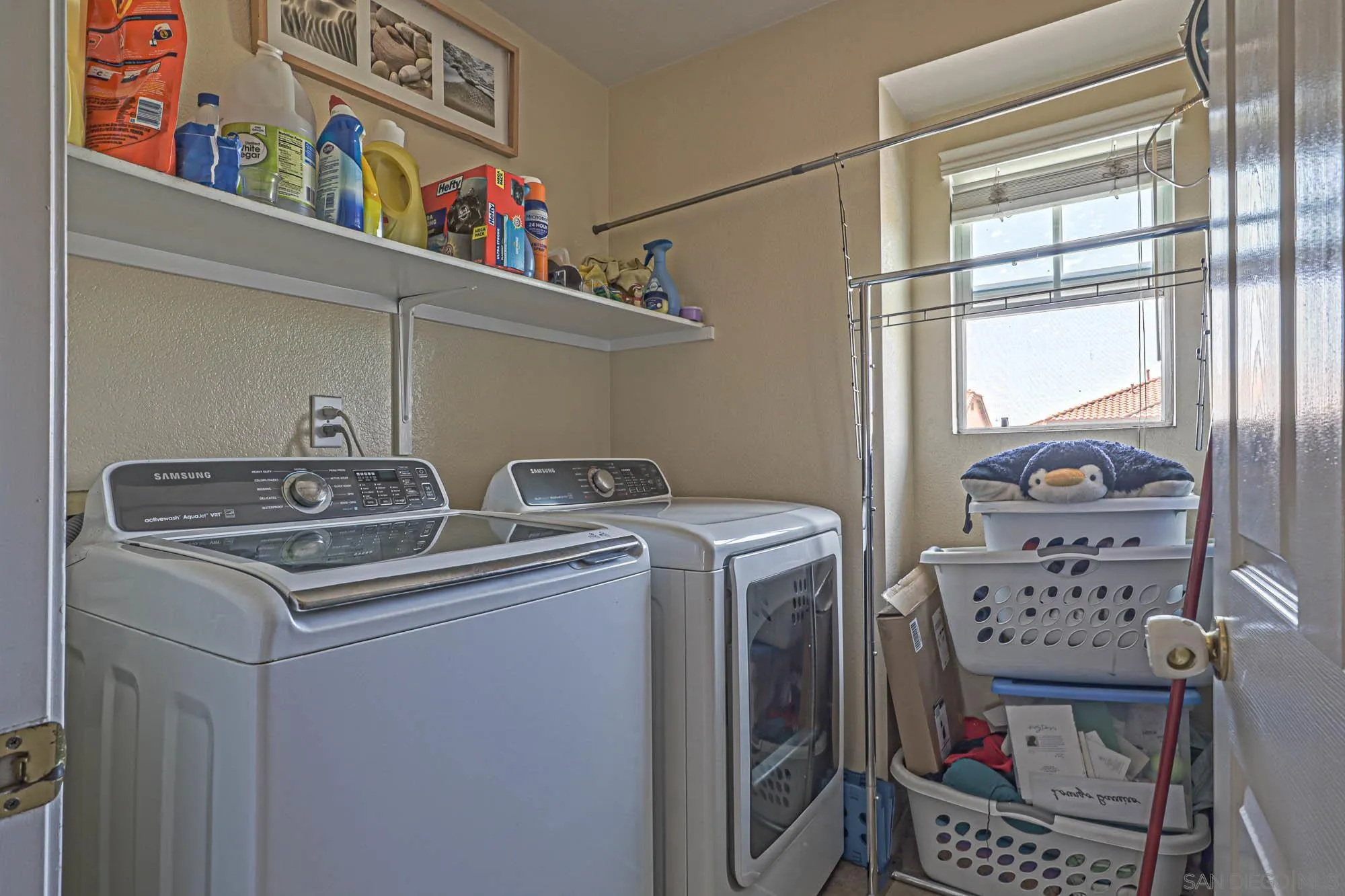 914 Rigley Street Chula Vista, CA 91911 - Photo 33 of 35 a utility room with dryer and washer