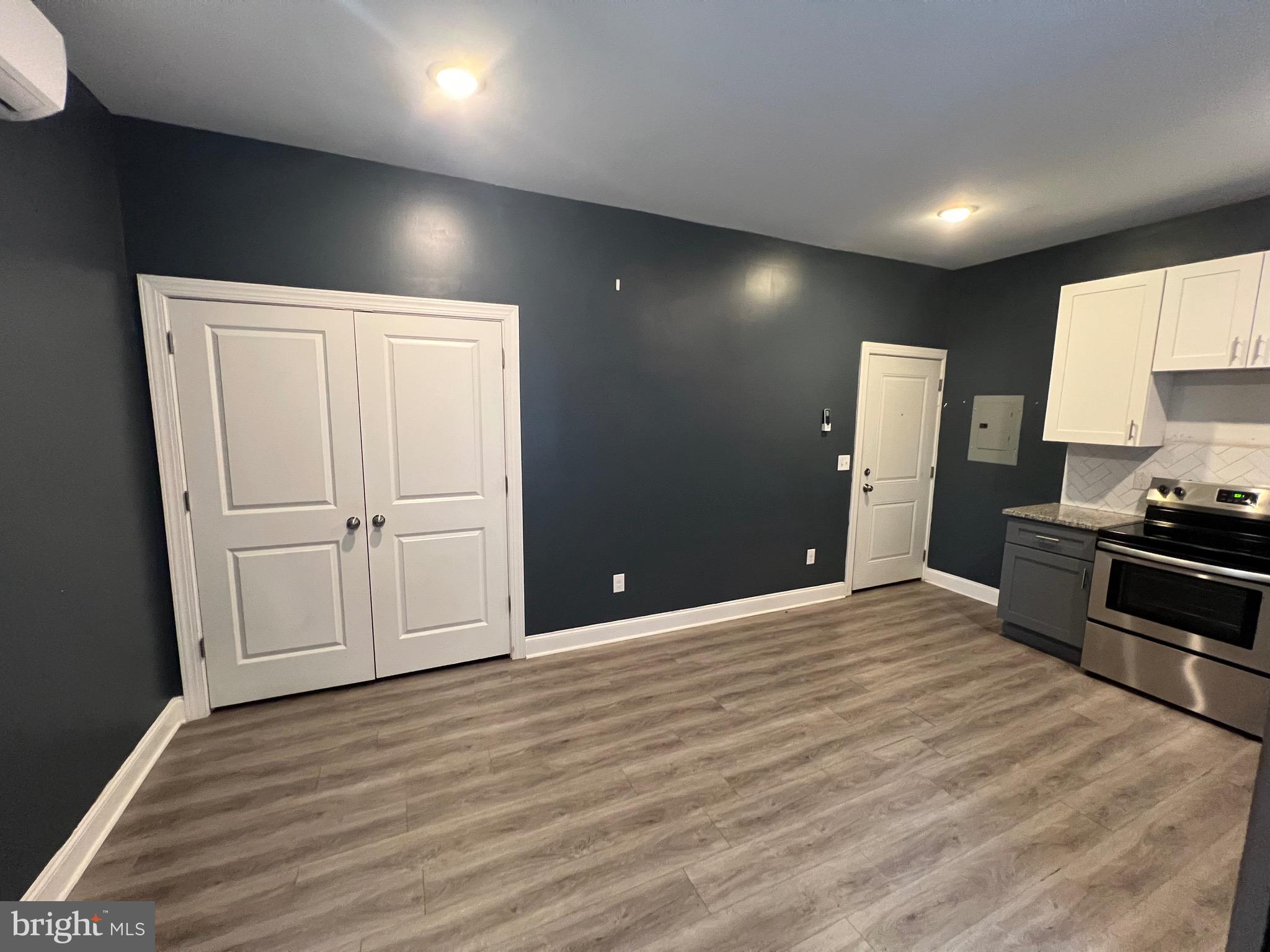 1829 North 33rd Street, Unit 2R Philadelphia, PA 19121 - Photo 5 of 7 a view of a livingroom with a furniture