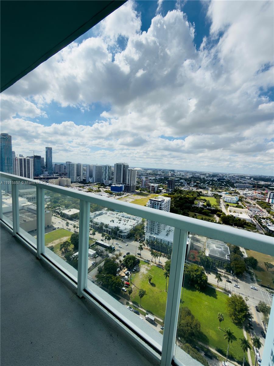 1900 North Bayshore Drive, Unit 3811 Miami, FL 33132 - Photo 13 of 27 a view of swimming pool from a balcony