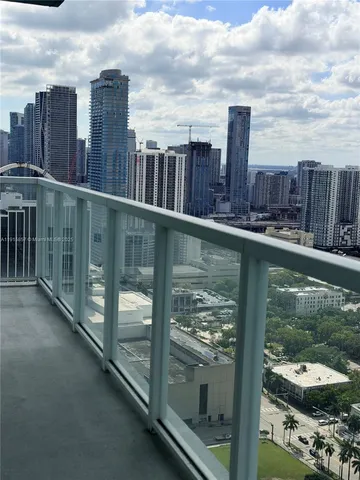 a view of a lake from a balcony