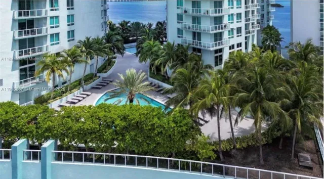 a living room with couches coffee table and a fireplace