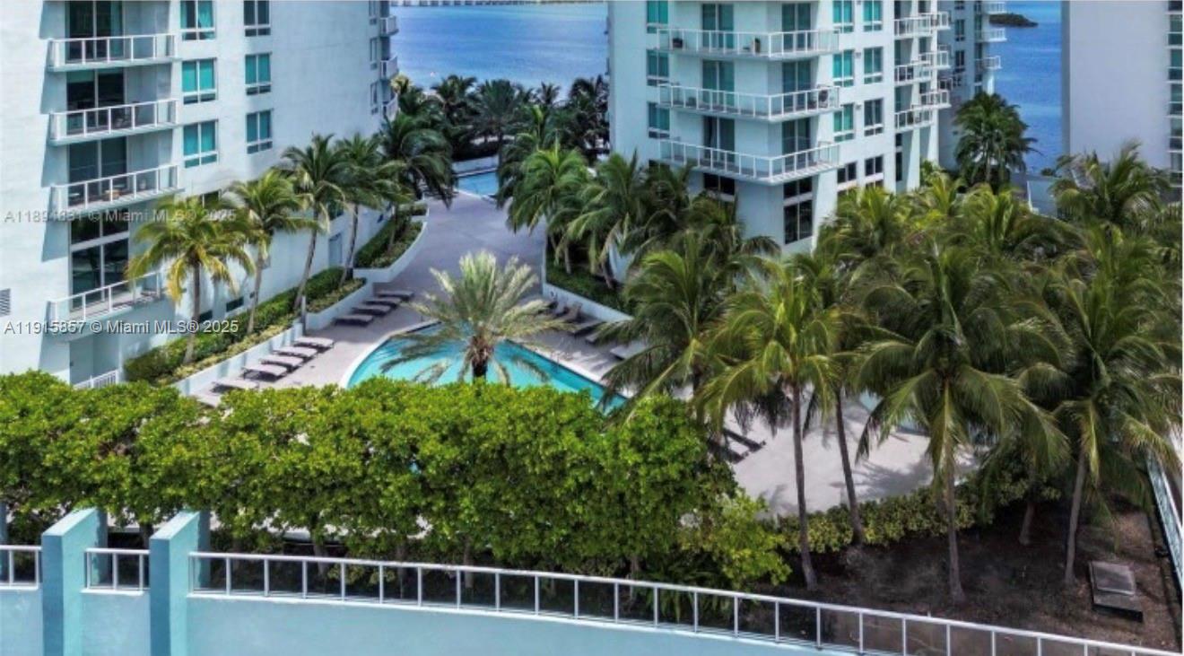 1900 North Bayshore Drive, Unit 3811 Miami, FL 33132 - Photo 16 of 27 a front view of a multi story building with yard