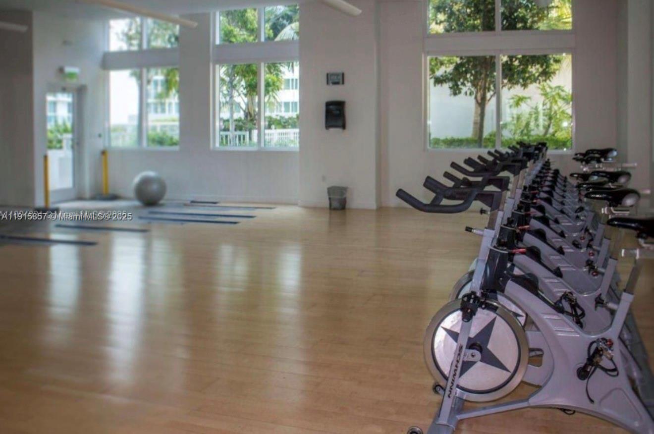 1900 North Bayshore Drive, Unit 3811 Miami, FL 33132 - Photo 22 of 27 a view of a room with gym equipment