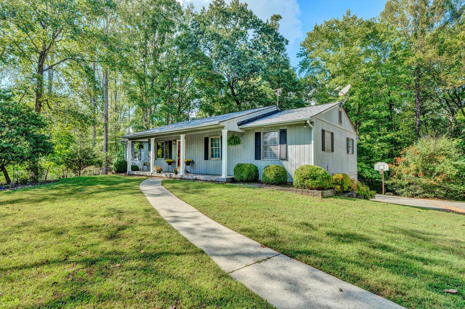 1319 Chandler Road Goodview, VA 24095 - Photo 4 of 53 a view of an house that has garden