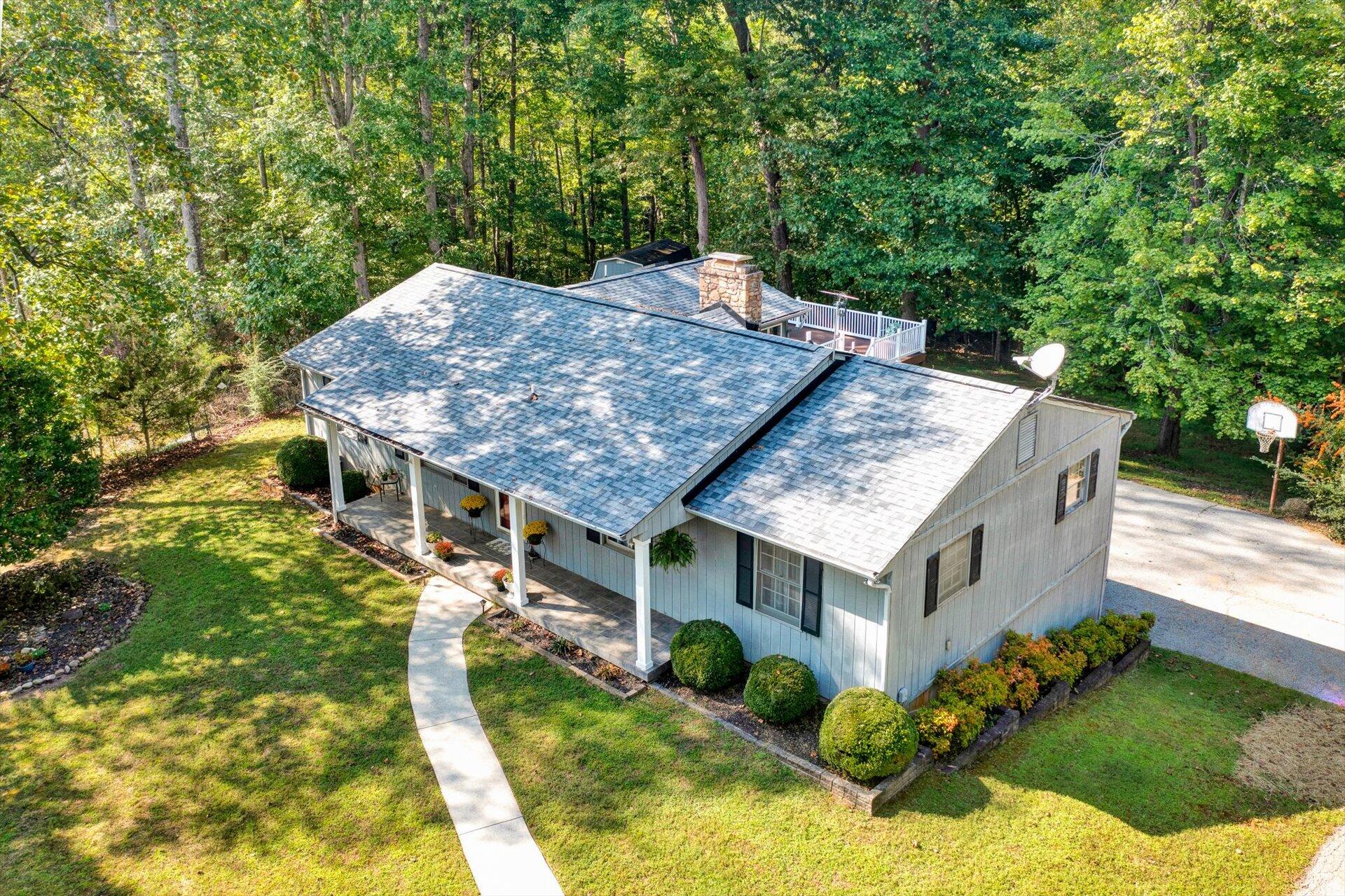1319 Chandler Road Goodview, VA 24095 - Photo 44 of 53 an aerial view of a house with a yard table and chairs