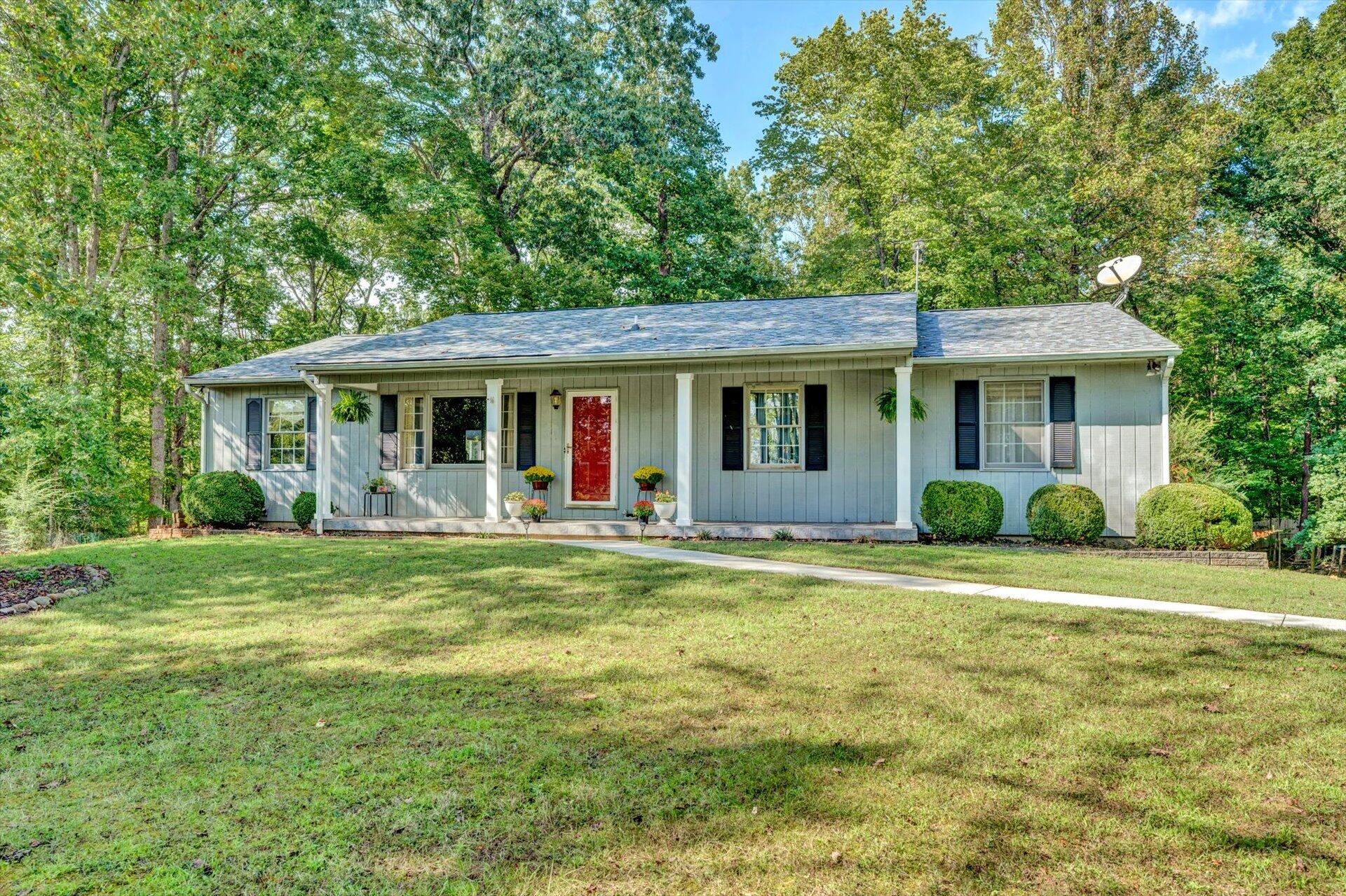 1319 Chandler Road Goodview, VA 24095 - Photo 5 of 53 a view of a house with a backyard