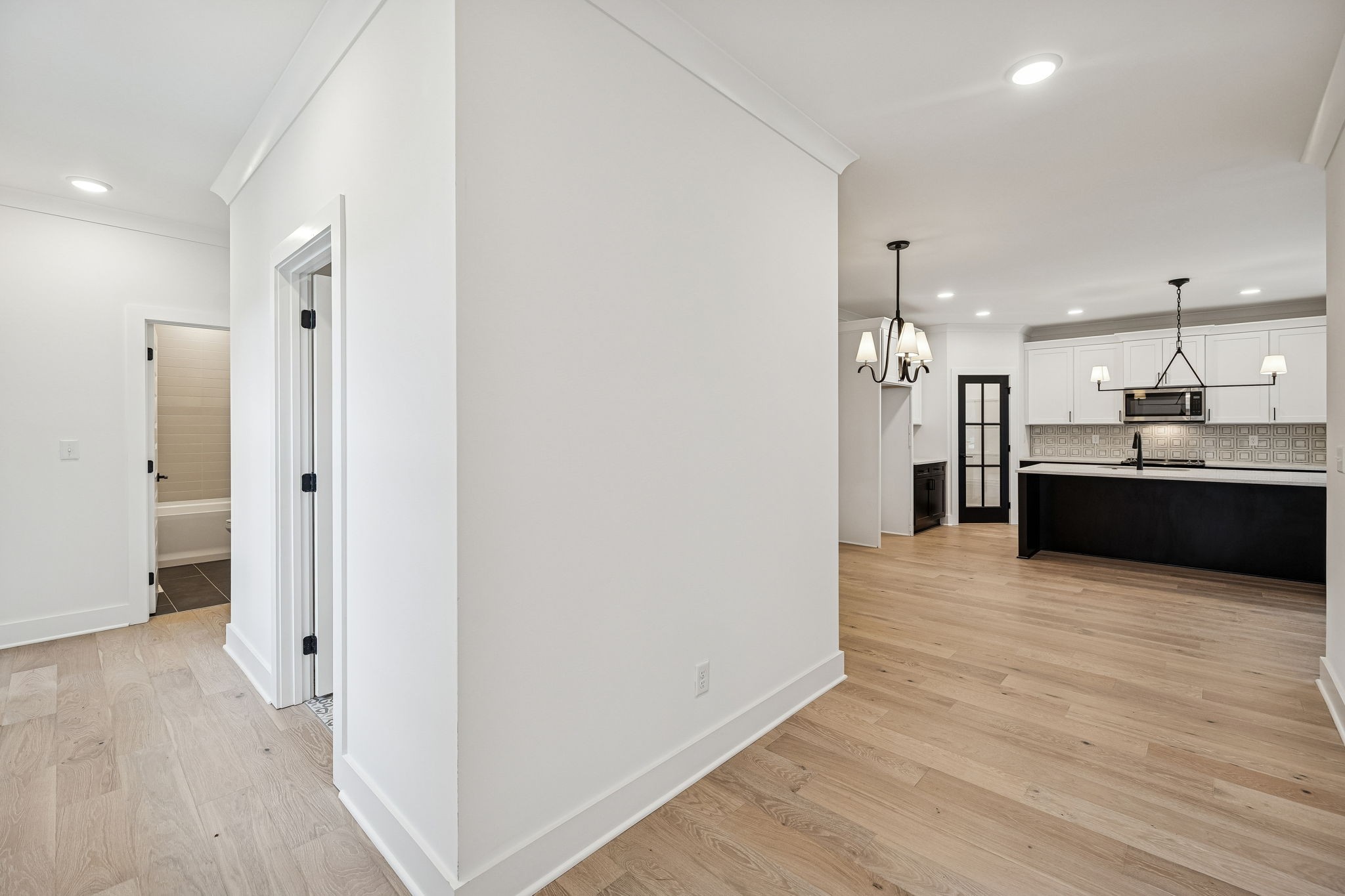 1501 Opossum Paw Road Beechgrove, TN 37018 - Photo 14 of 55 a view of a kitchen with a sink and a refrigerator