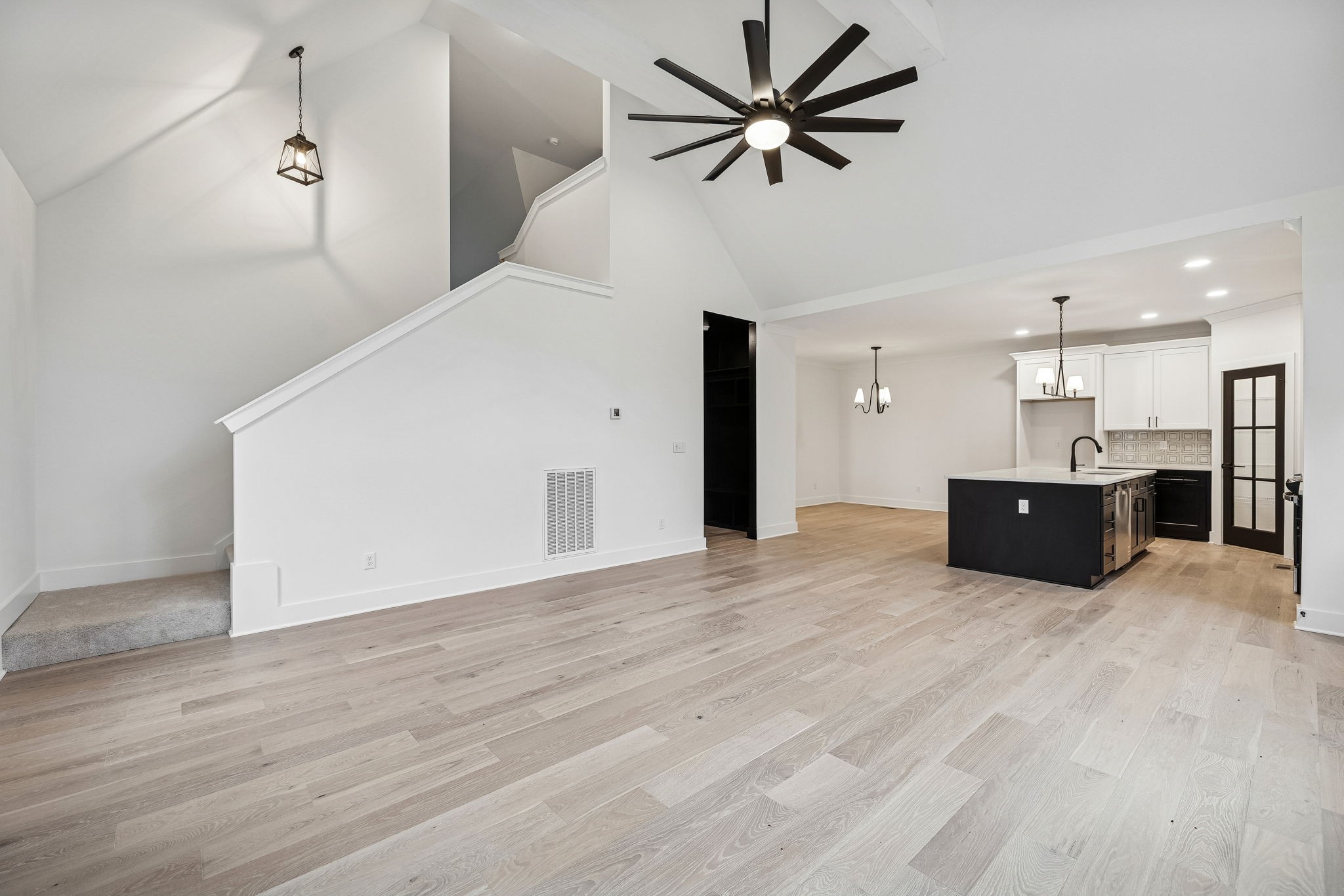 1501 Opossum Paw Road Beechgrove, TN 37018 - Photo 23 of 55 a view of a kitchen with a sink and a ceiling fan