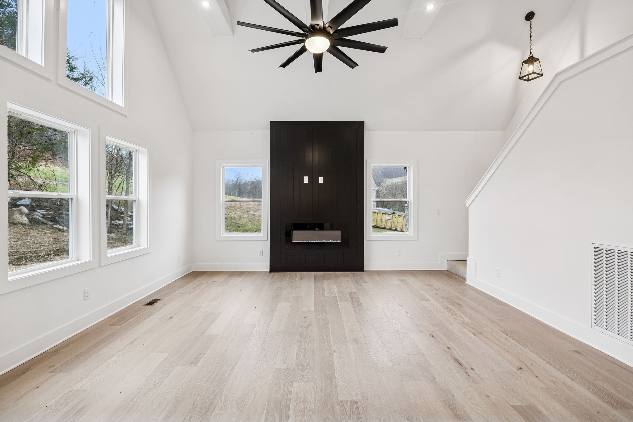 1501 Opossum Paw Road Beechgrove, TN 37018 - Photo 25 of 55 a view of an empty room with a window and wooden floor