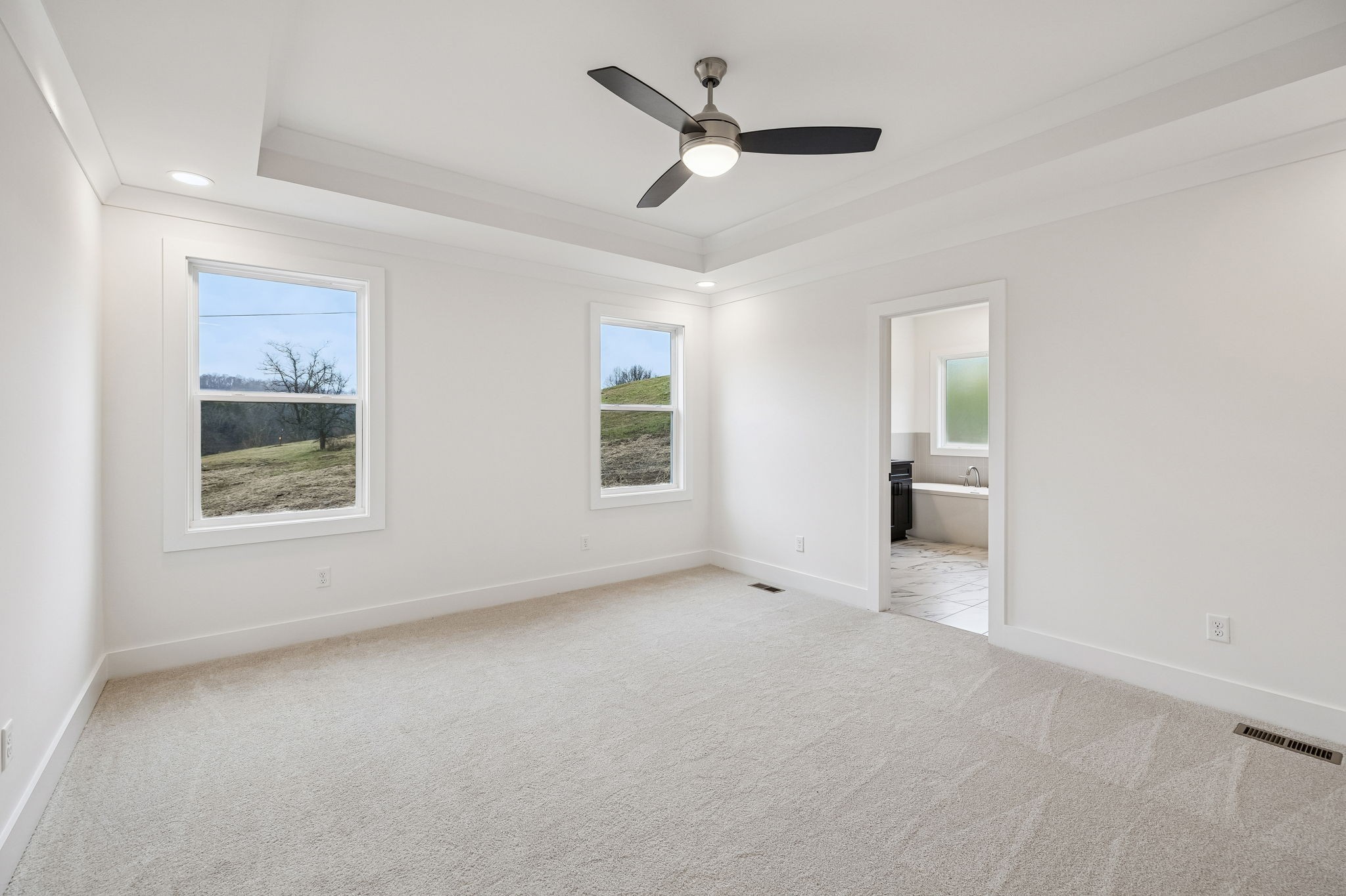 1501 Opossum Paw Road Beechgrove, TN 37018 - Photo 28 of 55 a view of a livingroom with a ceiling fan and window