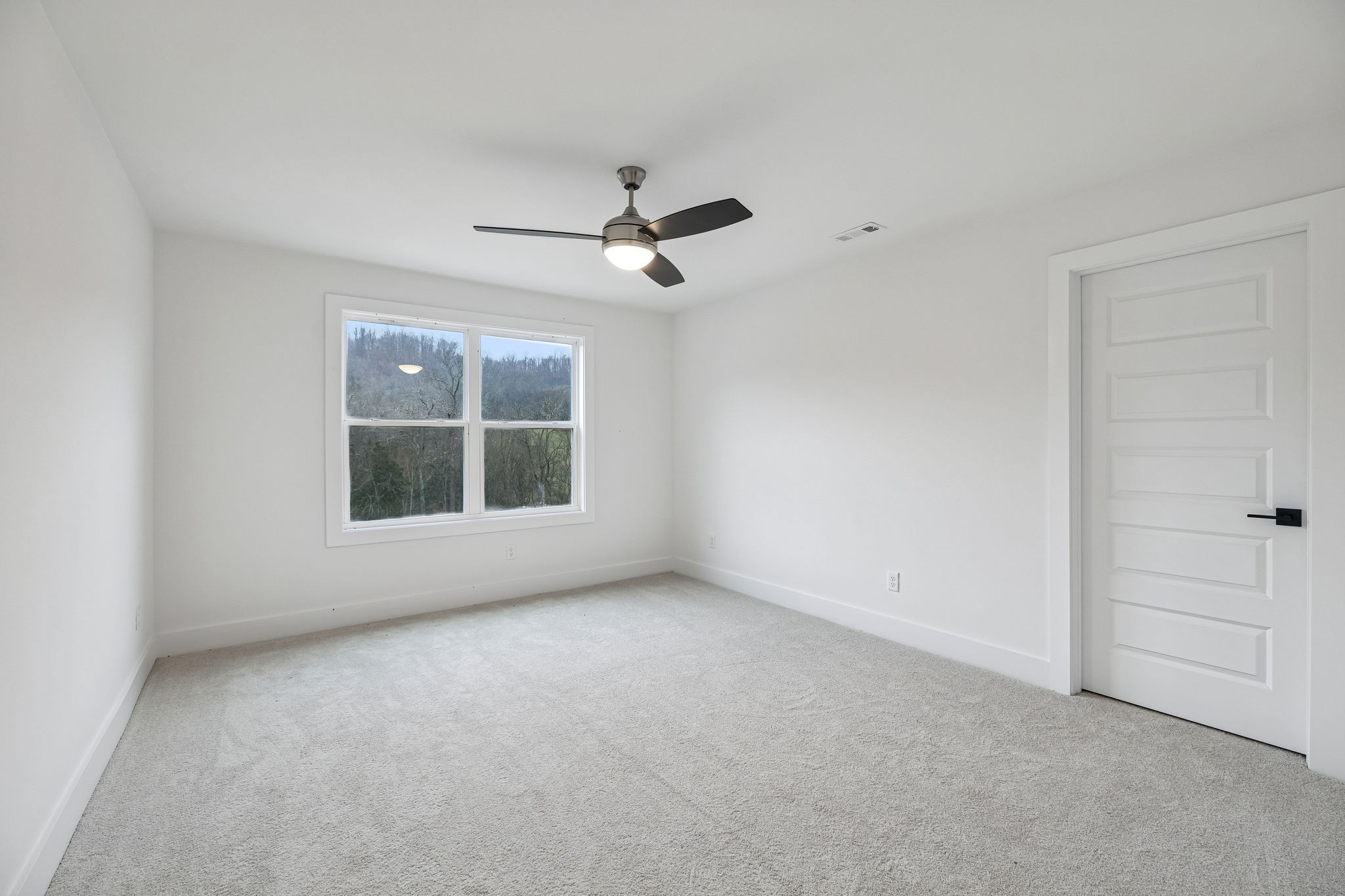 1501 Opossum Paw Road Beechgrove, TN 37018 - Photo 29 of 55 a view of an empty room with a window
