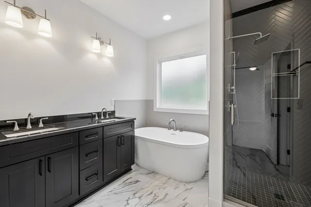 a bathroom with a sink and a shower