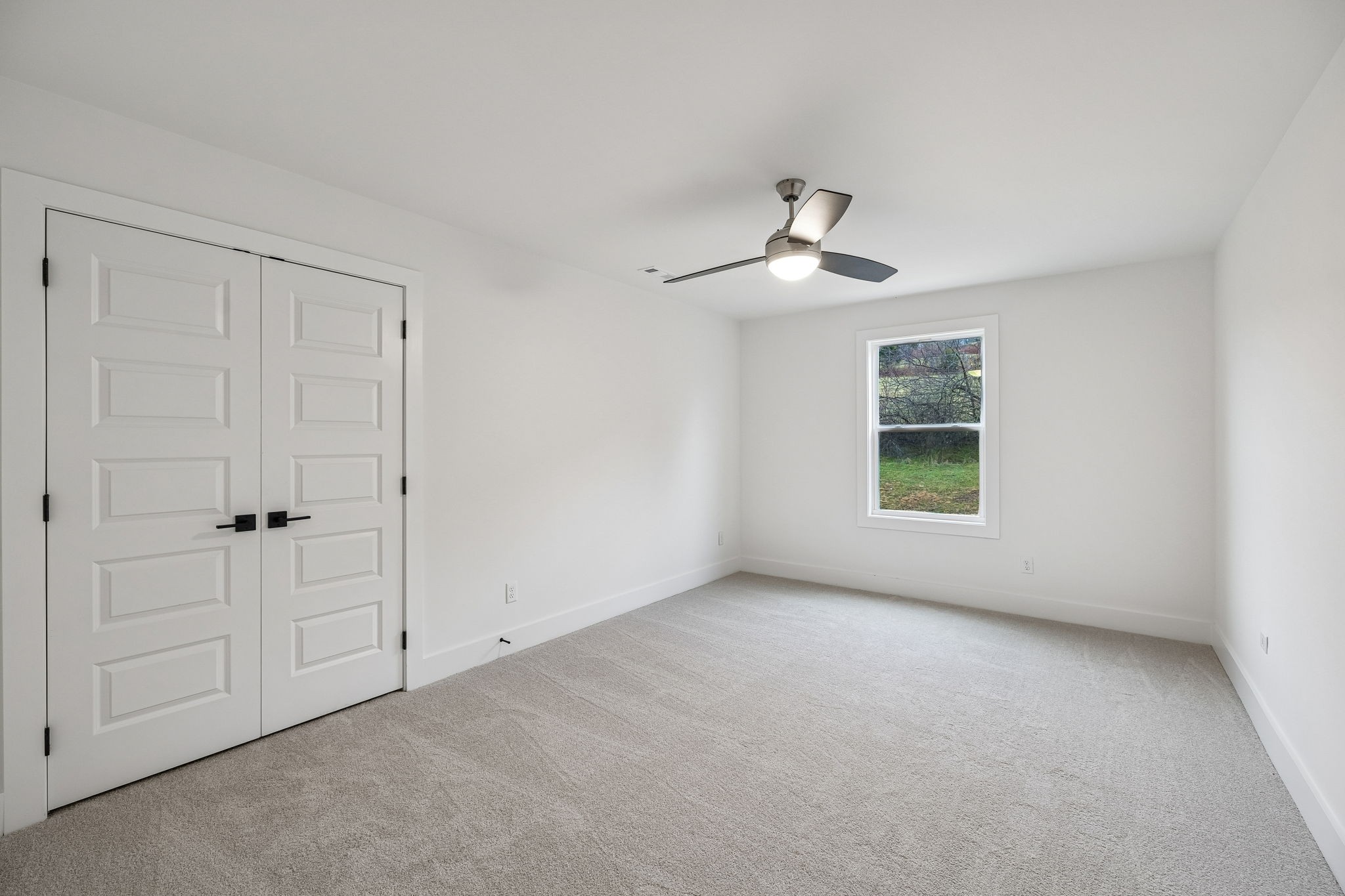 1501 Opossum Paw Road Beechgrove, TN 37018 - Photo 42 of 55 a view of an empty room with a window
