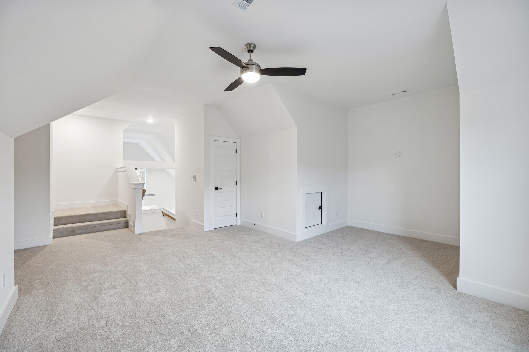 1501 Opossum Paw Road Beechgrove, TN 37018 - Photo 50 of 55 an empty room with a ceiling fan and window