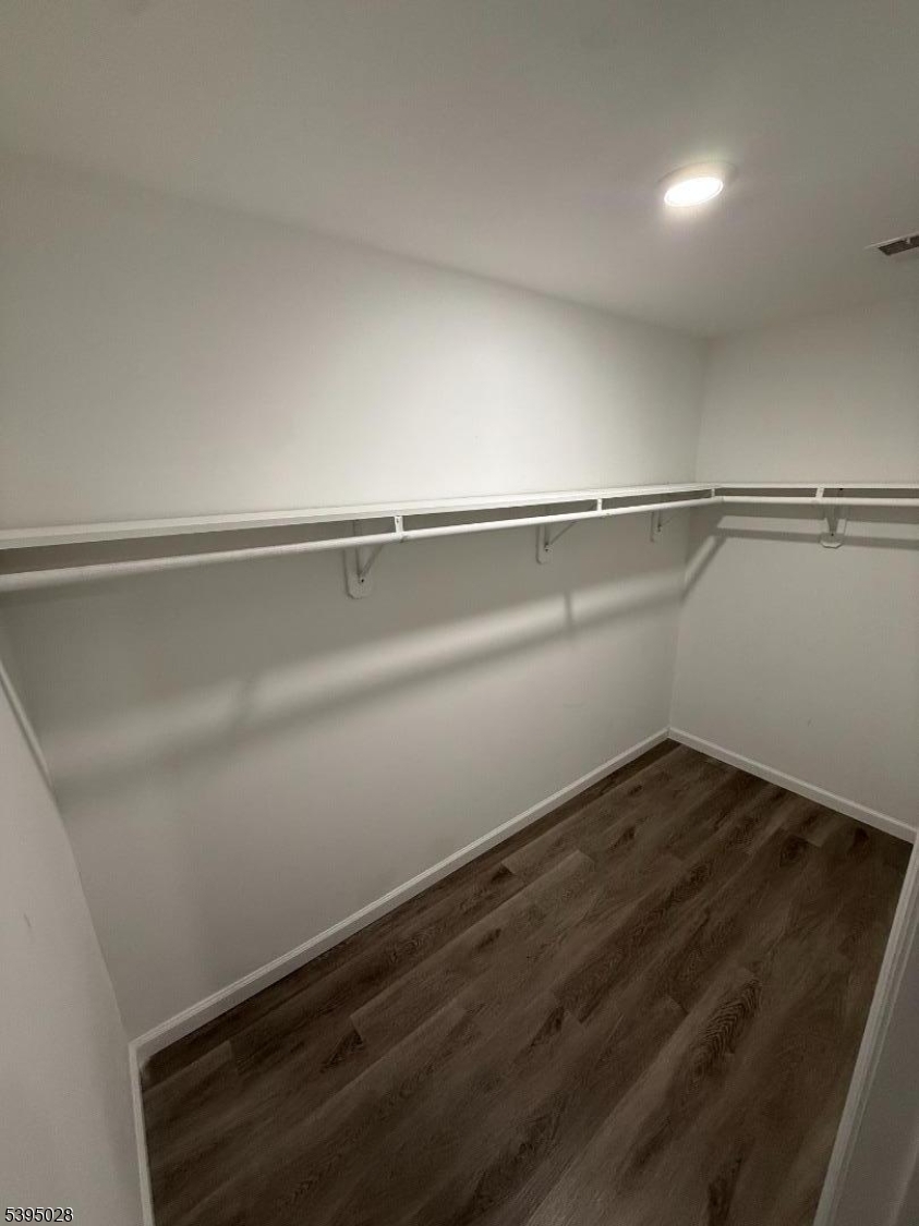 107 Willoughby Street, Unit 2 Newark, NJ 07112 - Photo 2 of 9 a view of small space with racks on the wall