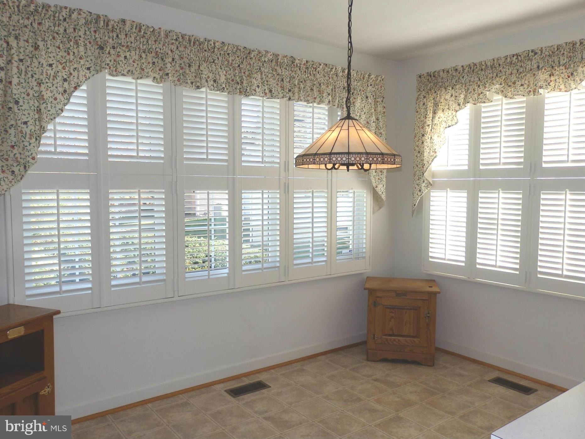 2452 Bear Den Road Frederick, MD 21701 - Photo 22 of 30 a room that has a window and a table in it