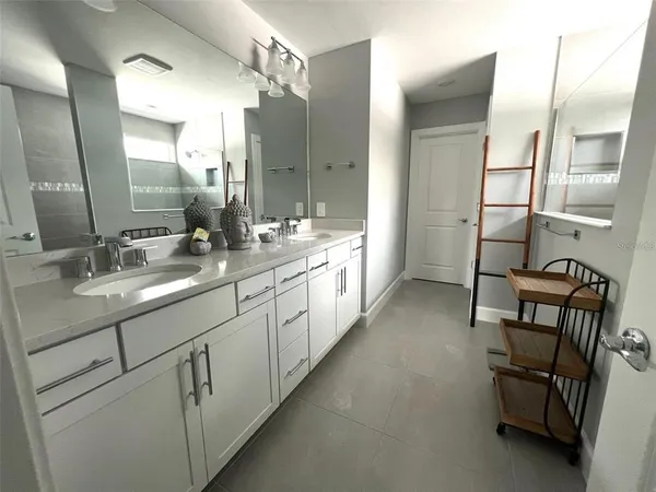 a view of a park with swings and slides