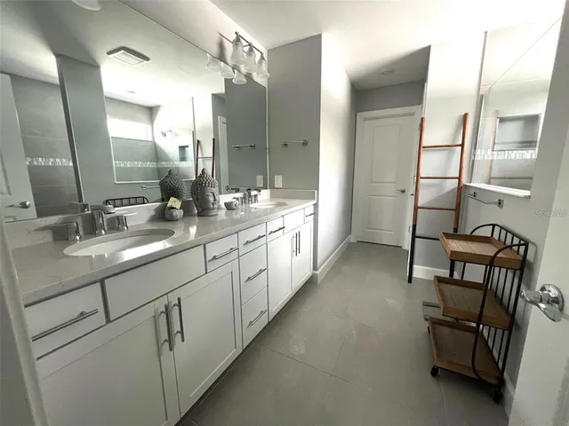 a view of a park with swings and slides