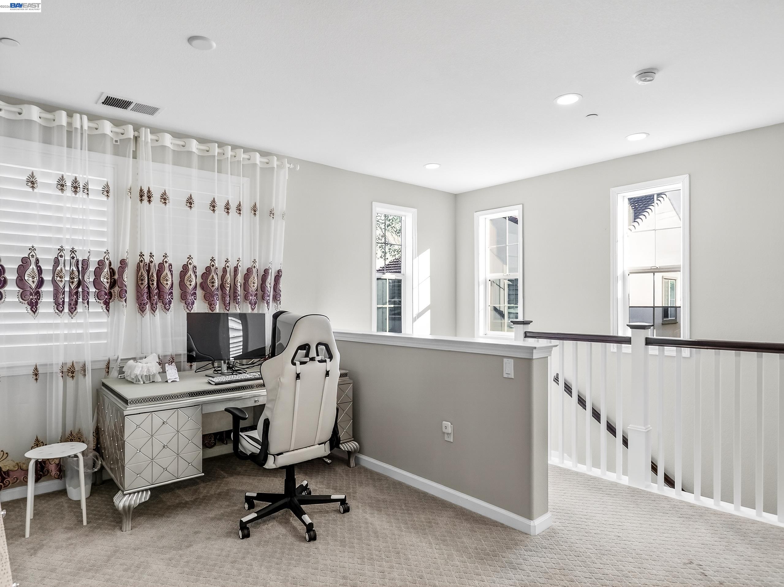5030 Brook Valley Loop San Jose, CA 95136 - Photo 17 of 37 a view of a workspace with furniture and a window
