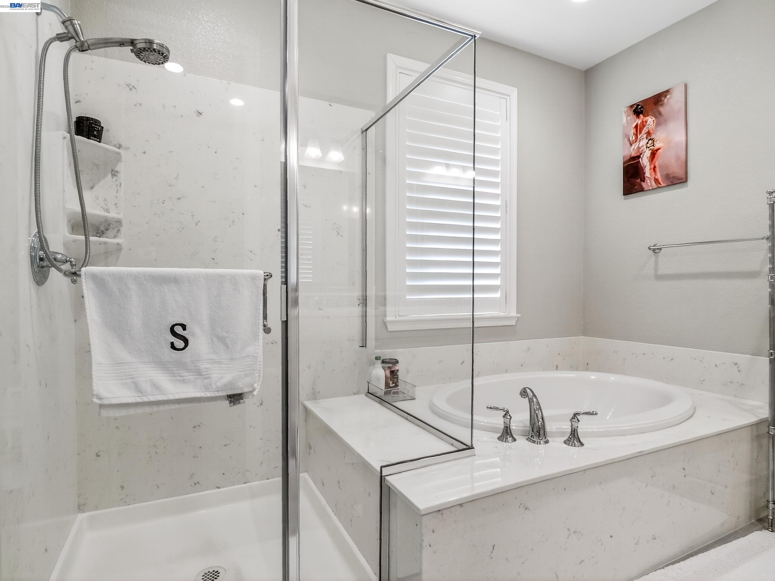 5030 Brook Valley Loop San Jose, CA 95136 - Photo 25 of 37 a bathroom with a tub sink and mirror