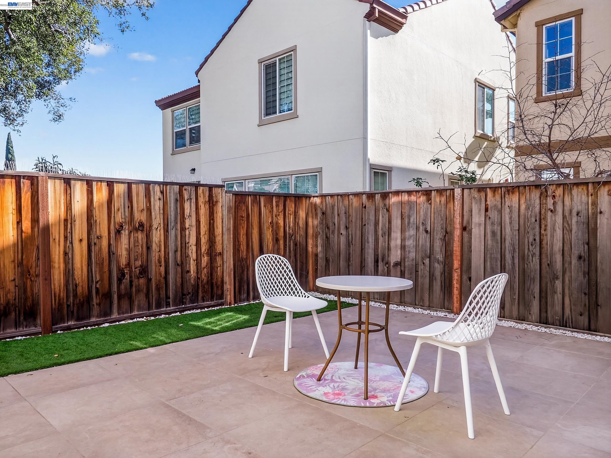 5030 Brook Valley Loop San Jose, CA 95136 - Photo 30 of 37 a patio with table and chairs