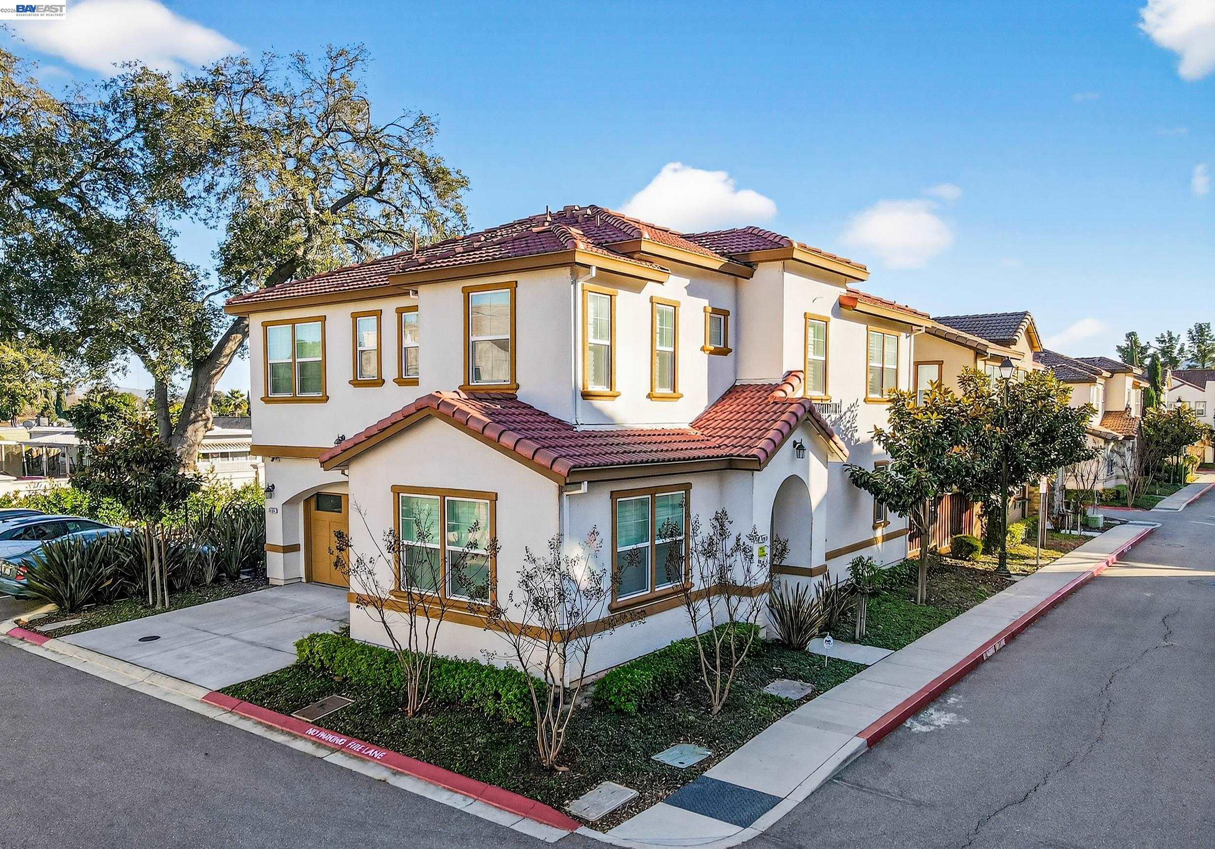 5030 Brook Valley Loop San Jose, CA 95136 - Photo 31 of 37 a front view of a house with a garden