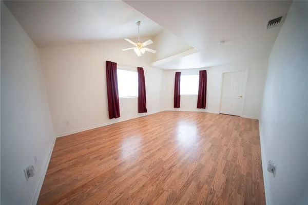 a living room with stainless steel appliances kitchen island granite countertop furniture and a kitchen view