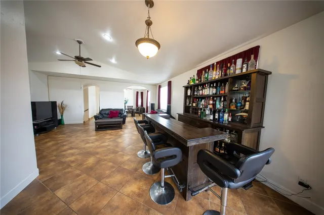 a view of a workspace with furniture