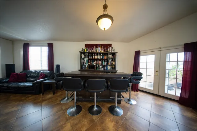 a view of a livingroom with furniture and window