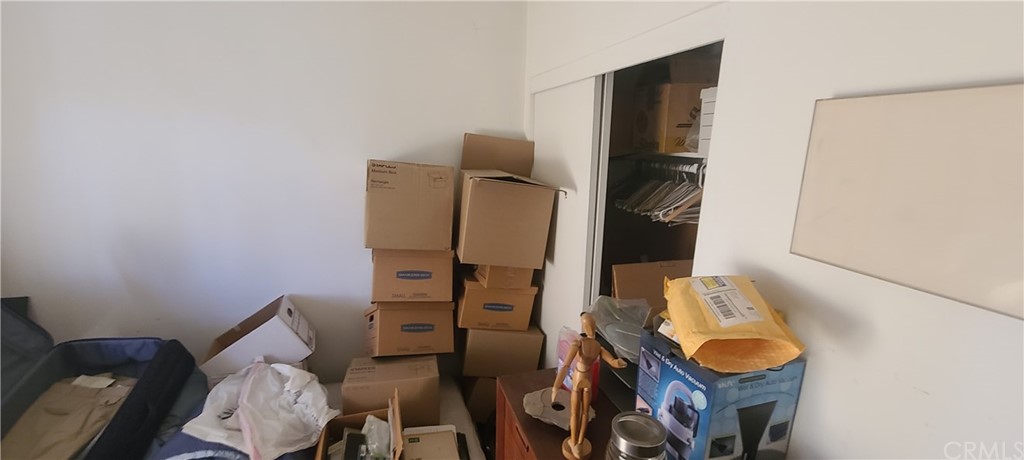1192 Mitchell Avenue, Unit 7 Tustin, CA 92780 - Photo 15 of 16 view of living room with furniture and wall painting