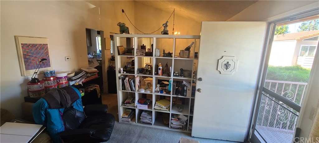 1192 Mitchell Avenue, Unit 7 Tustin, CA 92780 - Photo 3 of 16 a view of a hallway with wooden floor and windows