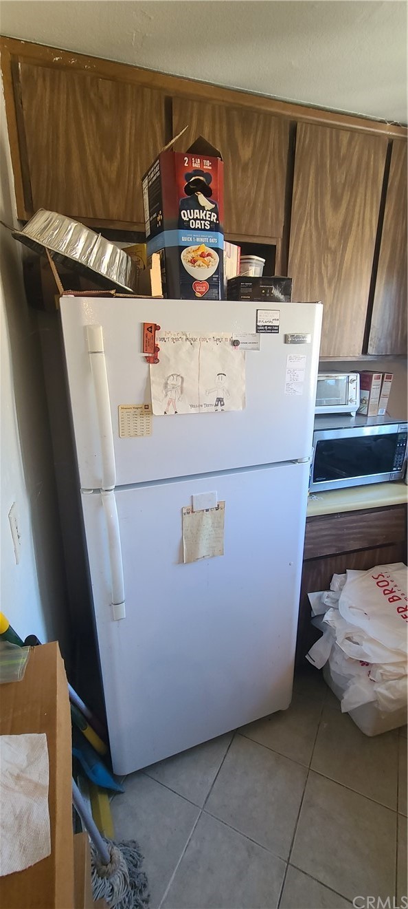 1192 Mitchell Avenue, Unit 7 Tustin, CA 92780 - Photo 6 of 16 a utility room with dryer and washer