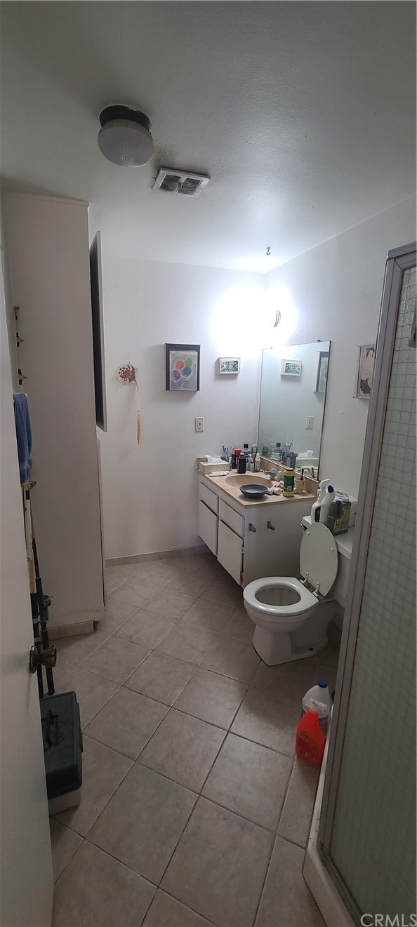 1192 Mitchell Avenue, Unit 7 Tustin, CA 92780 - Photo 8 of 16 a room with storage and utility