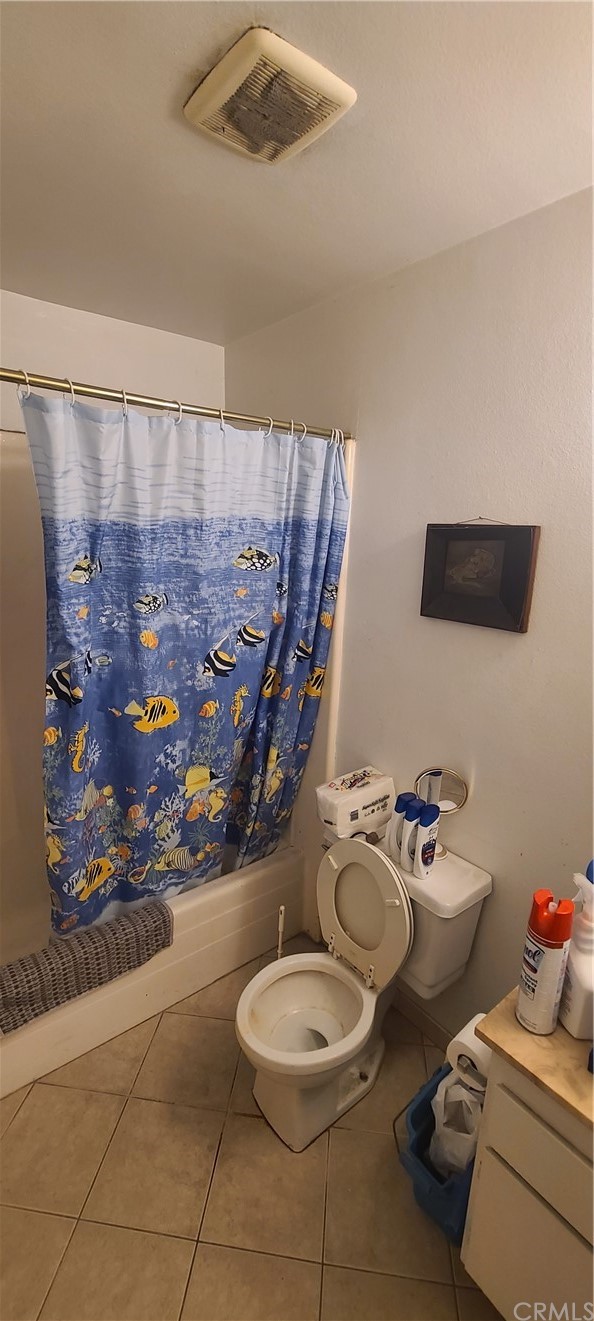 1192 Mitchell Avenue, Unit 7 Tustin, CA 92780 - Photo 9 of 16 a bathroom with a toilet mirror and sink
