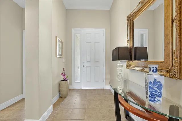 a bedroom with a bed and glass wall