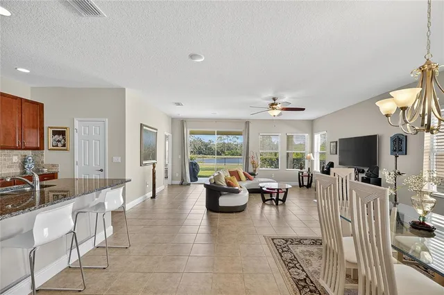 a view of a lake with houses in the back