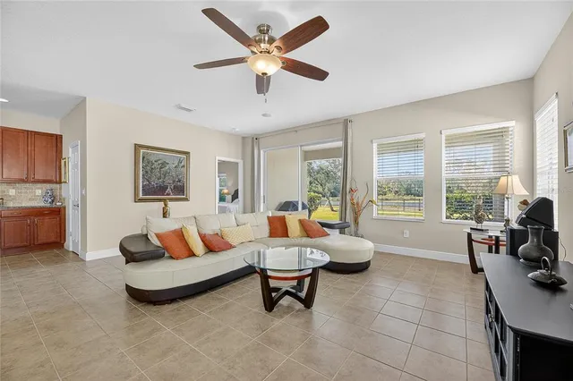 an aerial view of a house with garden space and outdoor seating