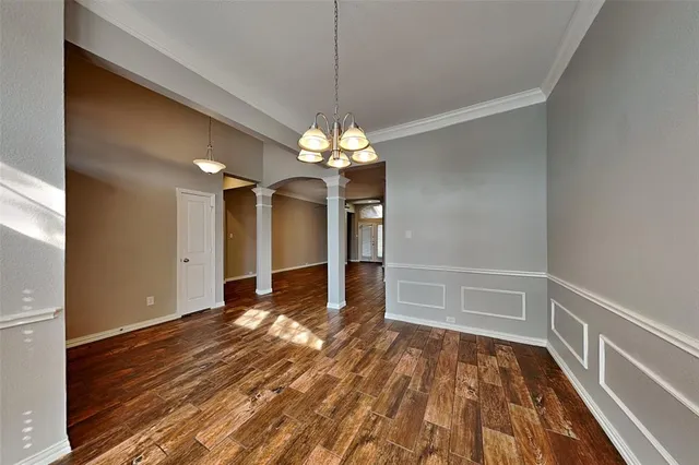 a view of a livingroom with wooden floor