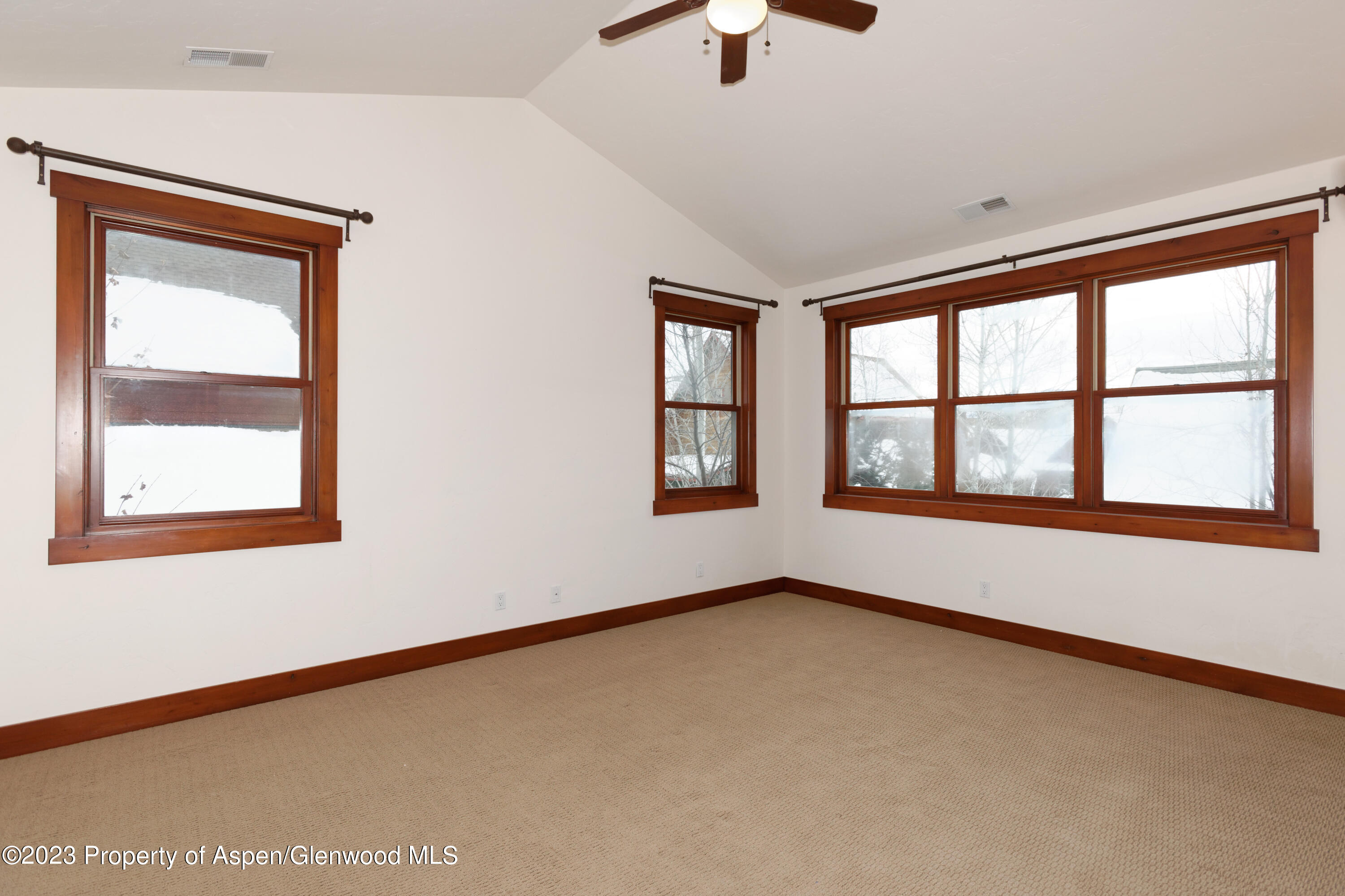 210 Juniper Court Basalt, CO 81621 - Photo 11 of 18 a view of an empty room with a window
