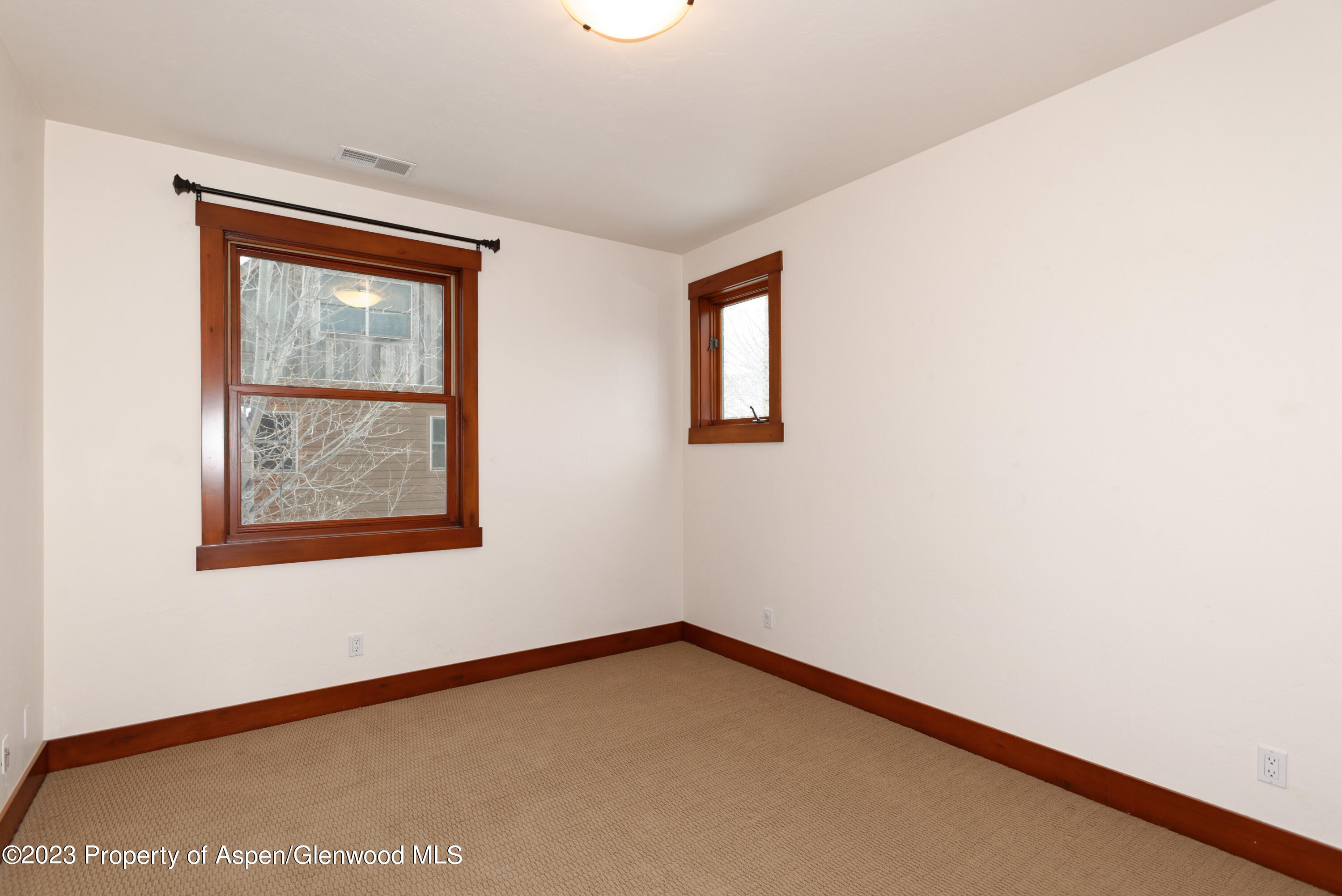 210 Juniper Court Basalt, CO 81621 - Photo 14 of 18 a view of an empty room with a window