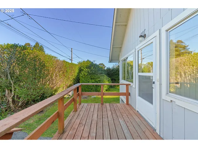 a view of balcony with couch and wooden floor