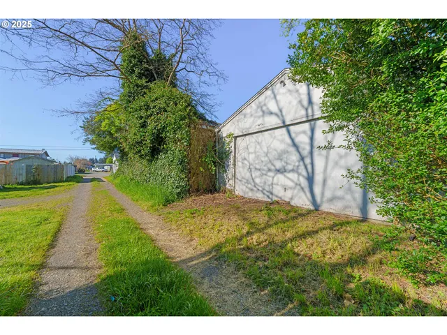 a view of yard from a tub