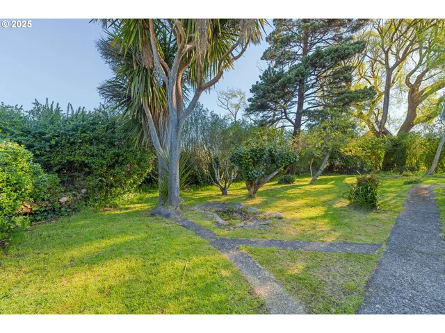 a view of swimming pool with a yard