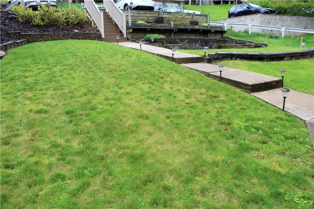 3545 Library Road Pittsburgh, PA 15234 - Photo 22 of 25 a view of a backyard with a garden