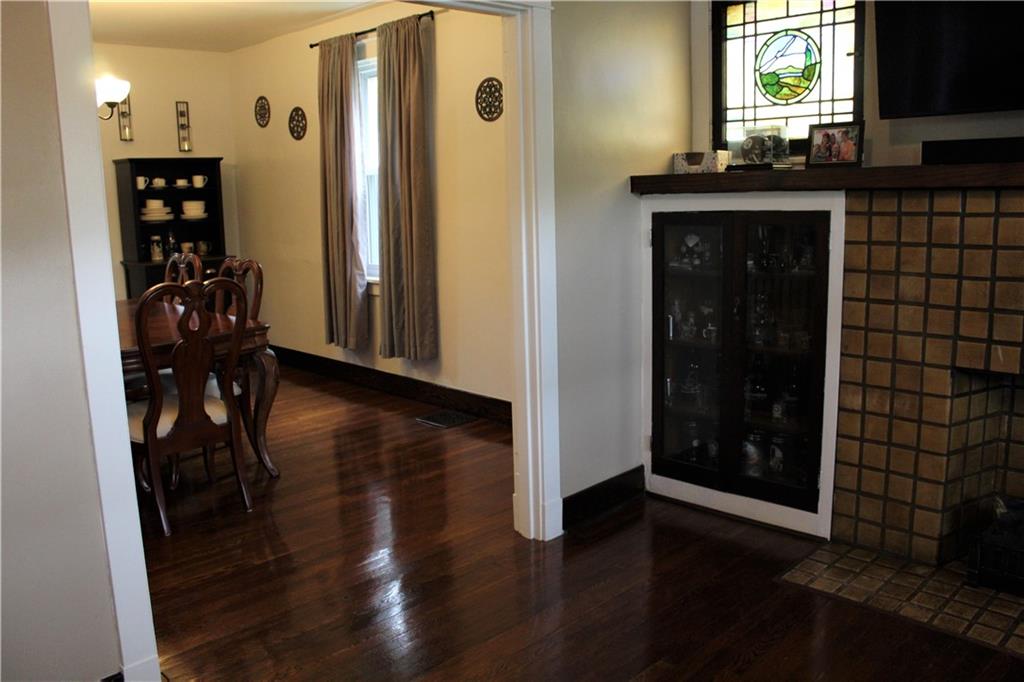 3545 Library Road Pittsburgh, PA 15234 - Photo 6 of 25 a kitchen with stainless steel appliances a refrigerator and a wooden floor