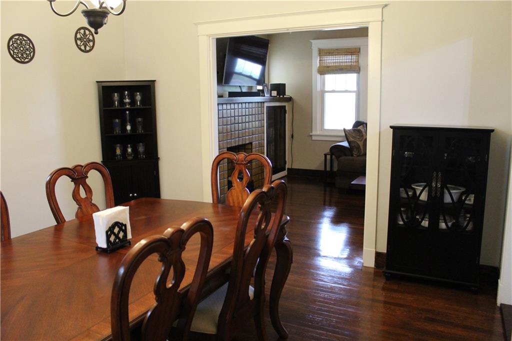 3545 Library Road Pittsburgh, PA 15234 - Photo 8 of 25 a view of a dining room with furniture and chandelier