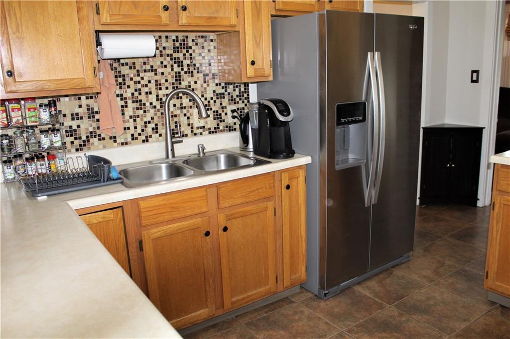3545 Library Road Pittsburgh, PA 15234 - Photo 9 of 25 a kitchen with stainless steel appliances a refrigerator and a sink